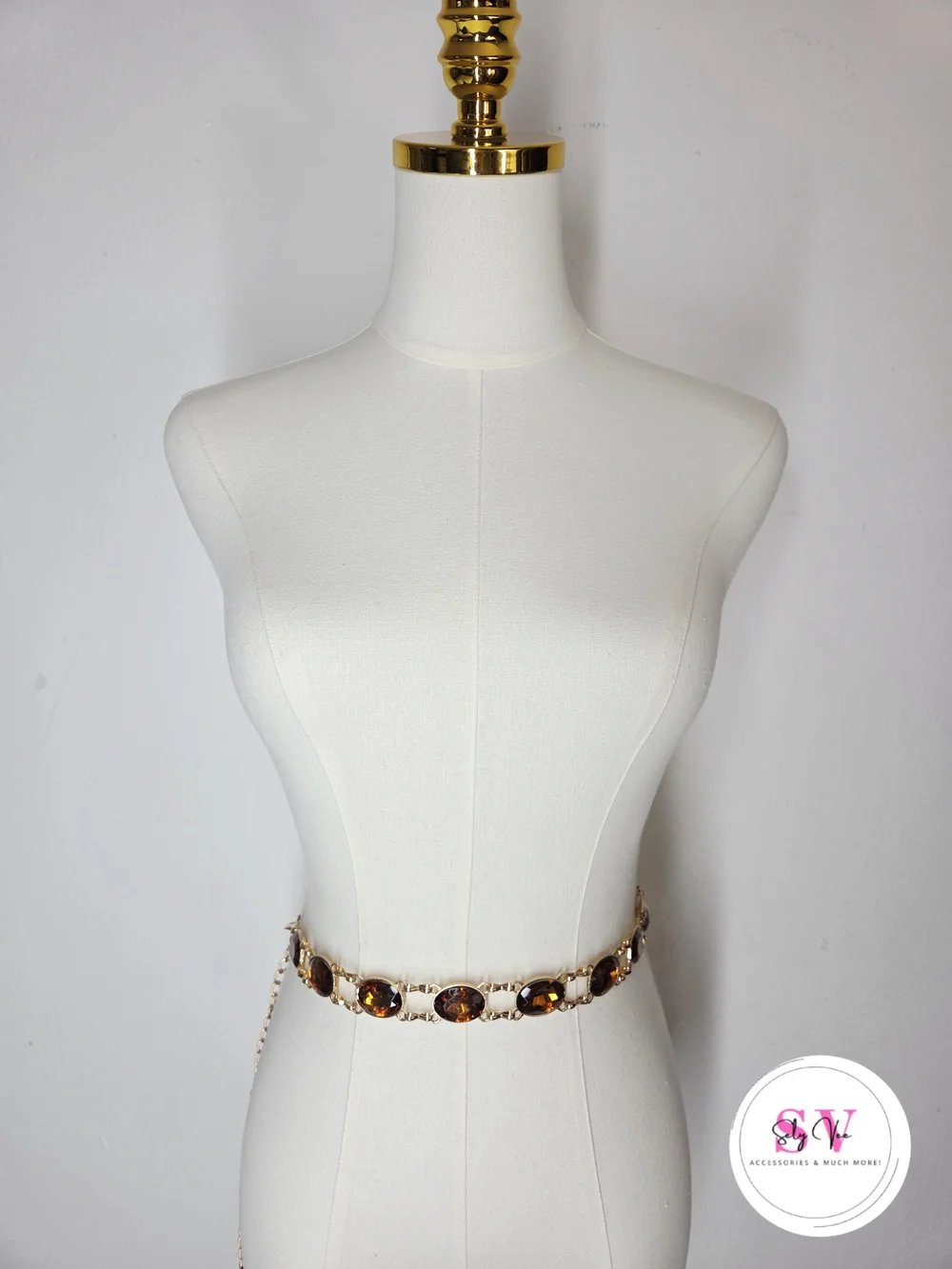 Gold chain belt with brown oval gemstone